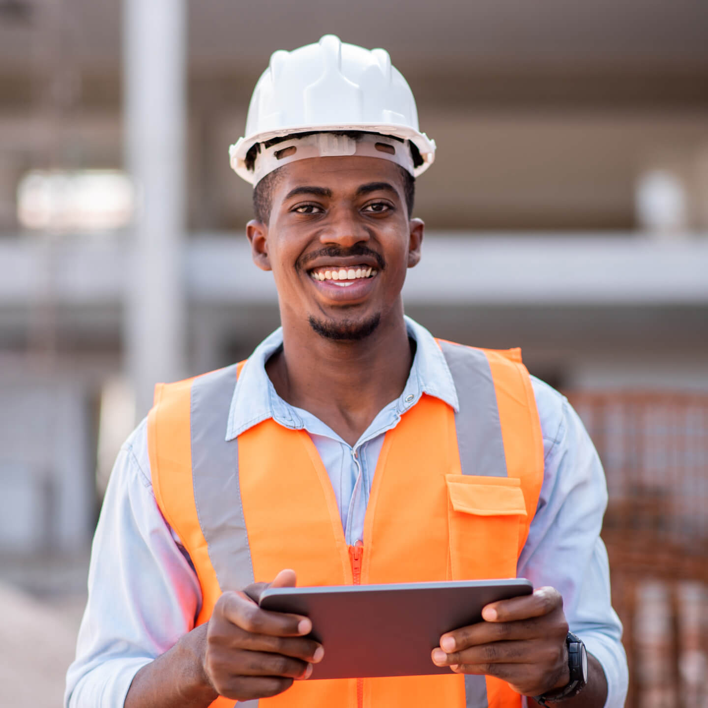 A project manager confidently reviewing contractor qualifications on a tablet.